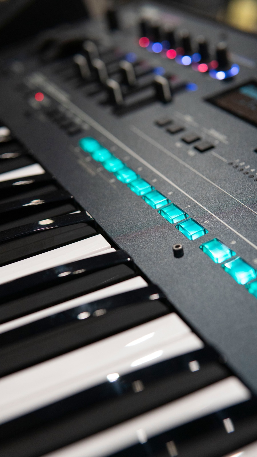 Synthesizer panel with glowing cyan controls